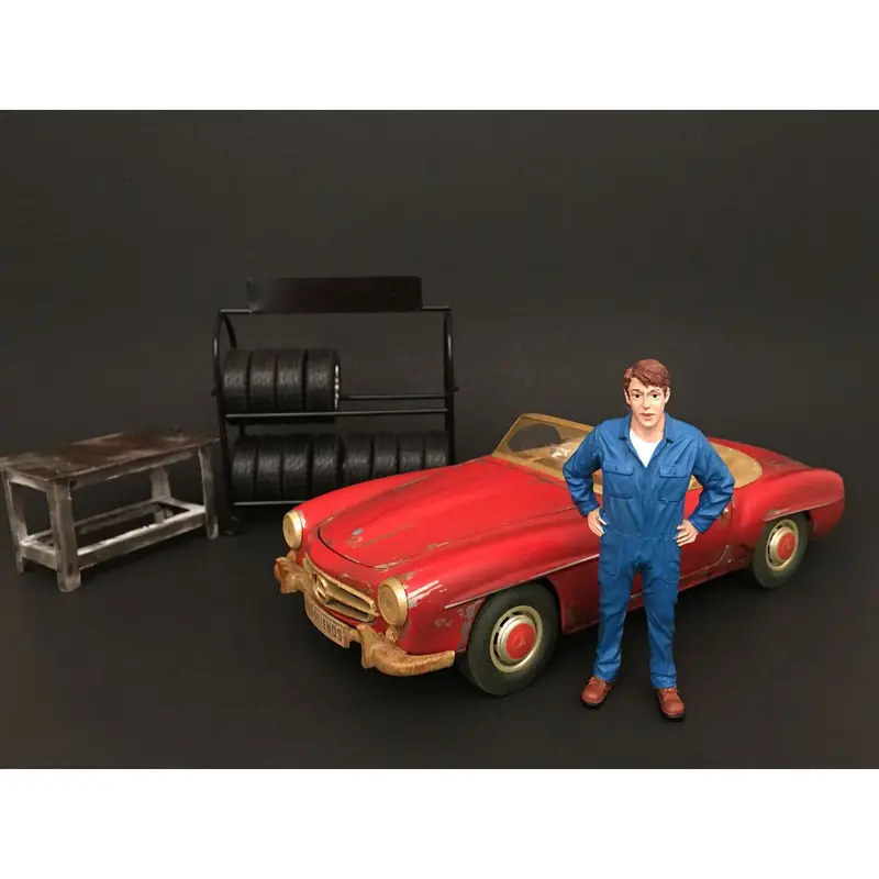 Mechanic John Inspecting Figure For 1
