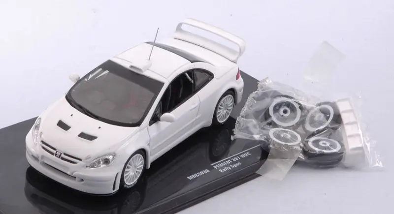 PEUGEOT 307 WRC WHITE 2 SET OF WHEELS AND TYRES AND EXTRA SPOILER 1